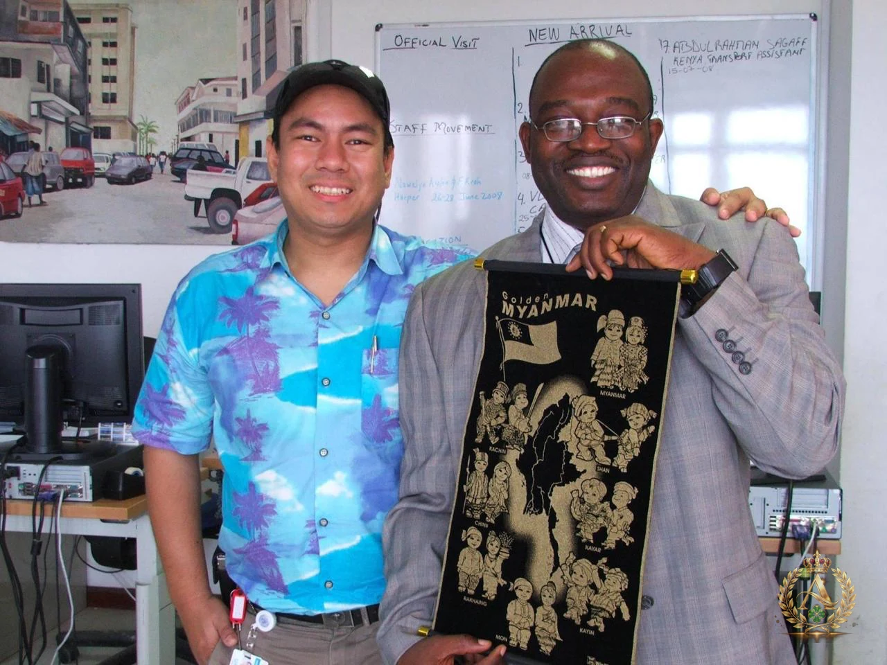 Aung Naing Oo with UNV Programme Manager Olufemi Olugbemi at the United Nations Mission in Liberia in 2007, where Aung's United Nations chapter began